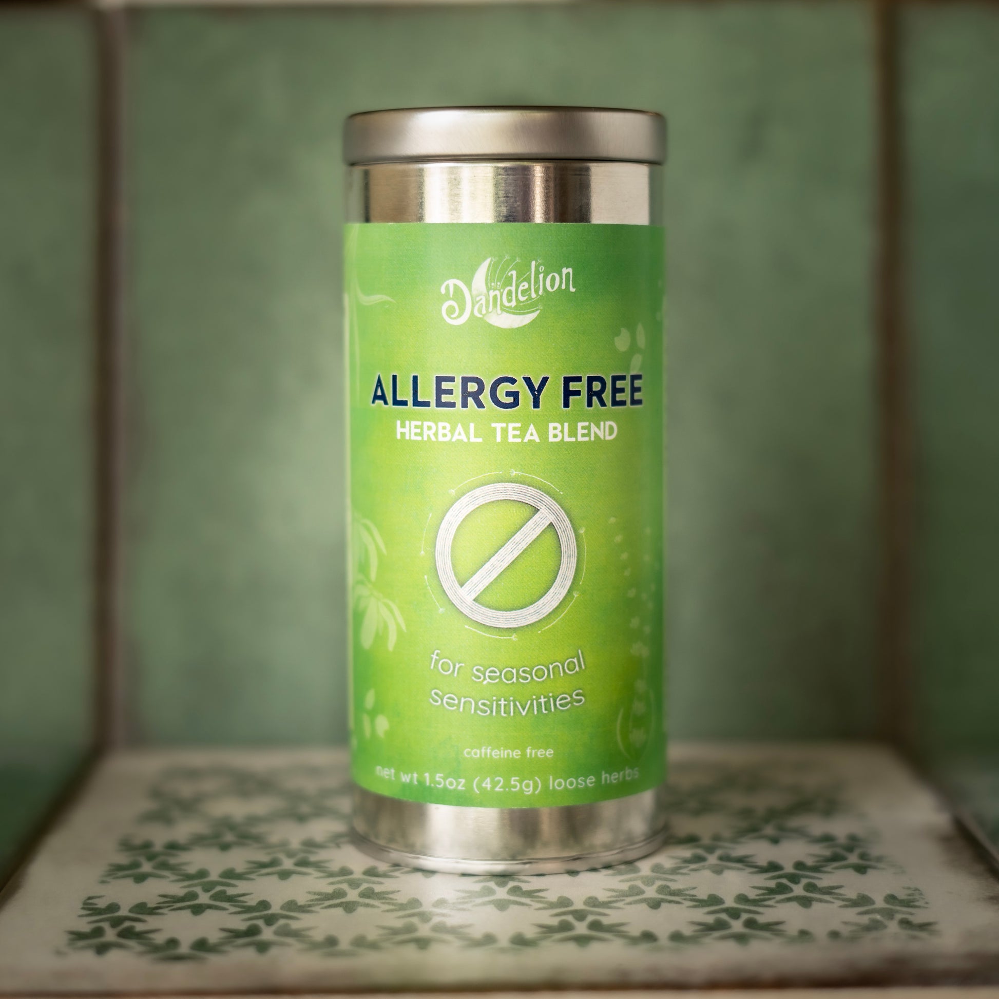 dandelion teahouse's allergy free herbal tea blend canister with a green label