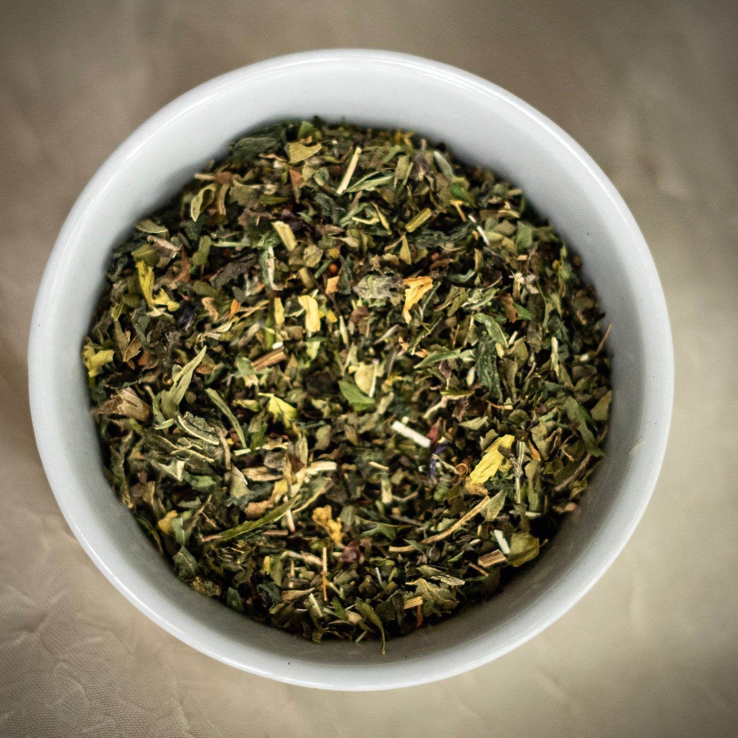 dandelion teahouse's allergy free herbal tea blend in a dish